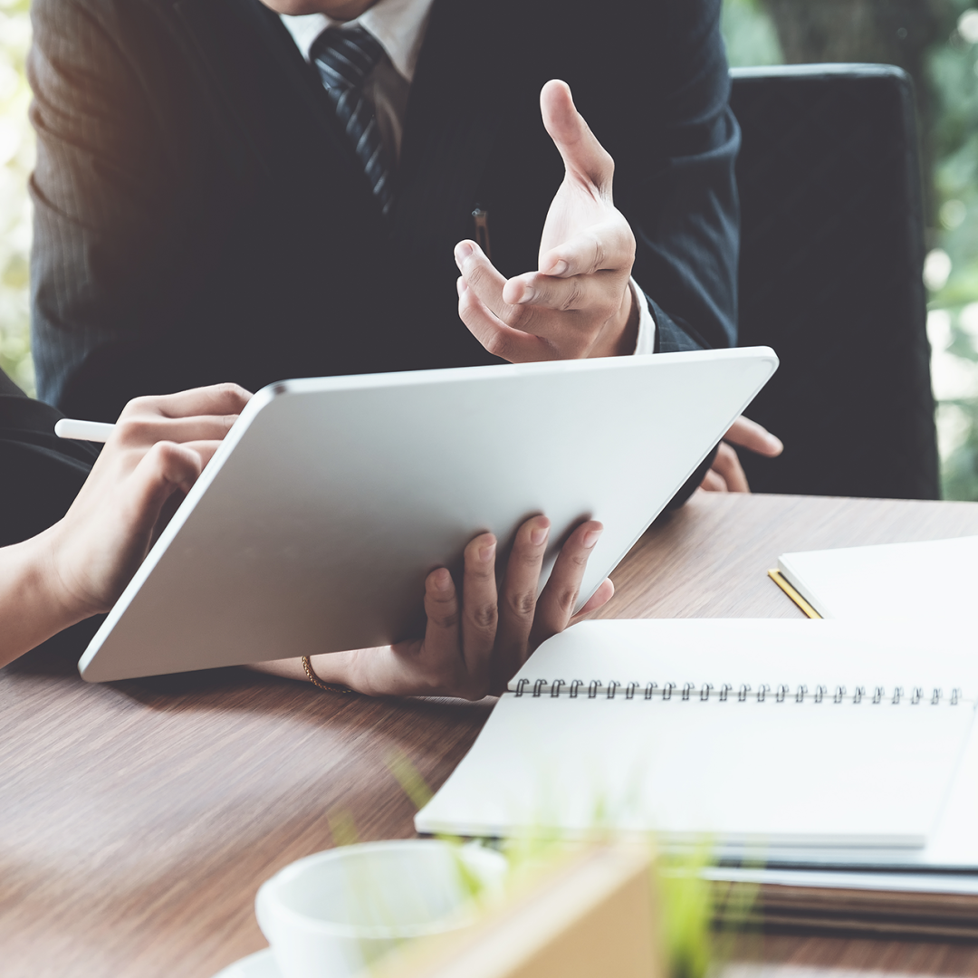 business-woman-lawyers-discussing-using-digital-tablet-wooden-desk-office-law-legal-services-advice-justice-concept.png